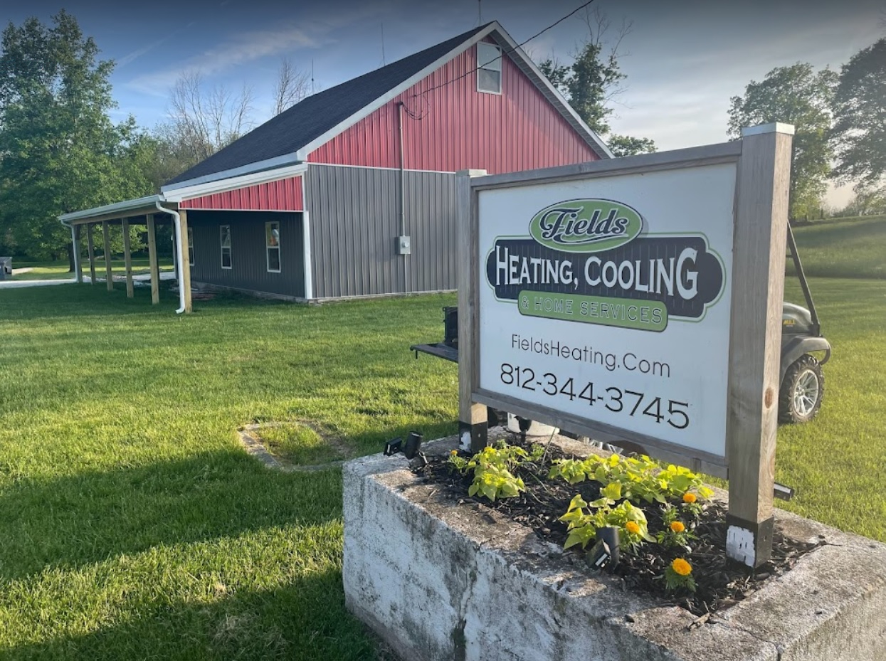 The barn shop and business sign at Fields Heating, Cooling & Home Services
